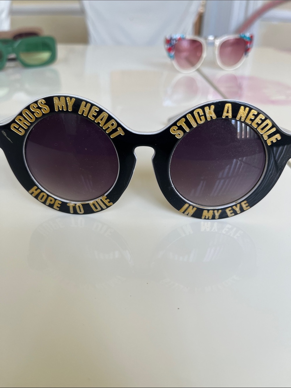 Black Round Statement Sunglasses with Gold Lettering